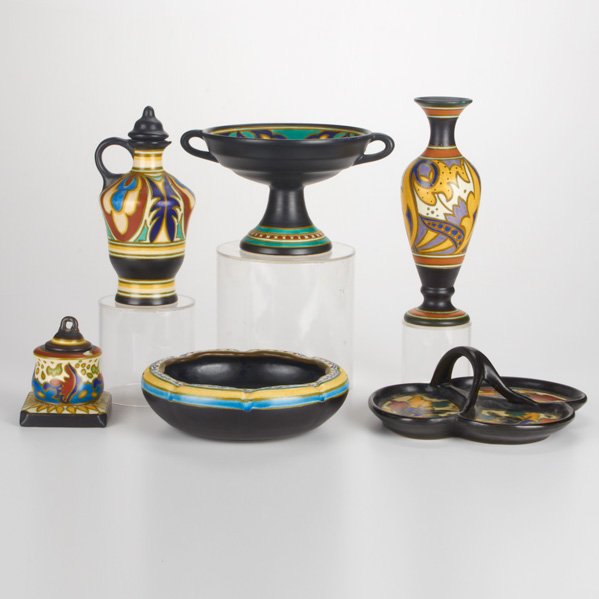 ZUID-HOLLAND GOUDA, ETC: Six pieces: Milo vase (1928), Tiny jug (1929), Madeleine tazza (1930), Emmy bowl (1926), Bergen dish (ca.1920), and Feo inkwell (1929), Gouda, Netherlands; All marked; Tallest: 9 1/2"