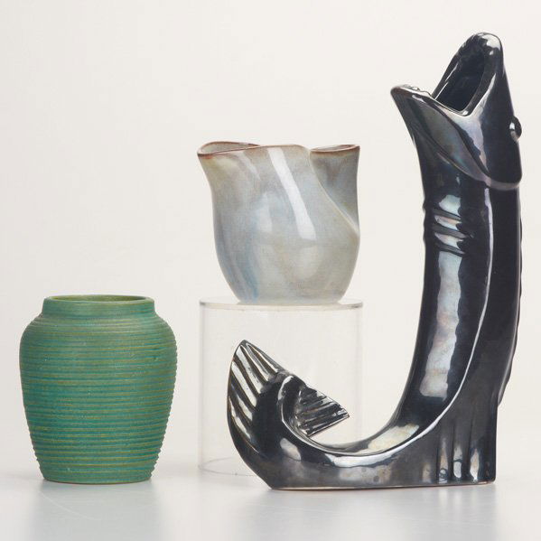 CHICAGO POTTERY: Three pieces: Illinois Institute of Technology fish vase in mirrored black glaze (1940), Eugene Deutch pinched pitcher (1945), and Ceramic Arts Studio turned vase in mat green by Rabbit; All marked; L