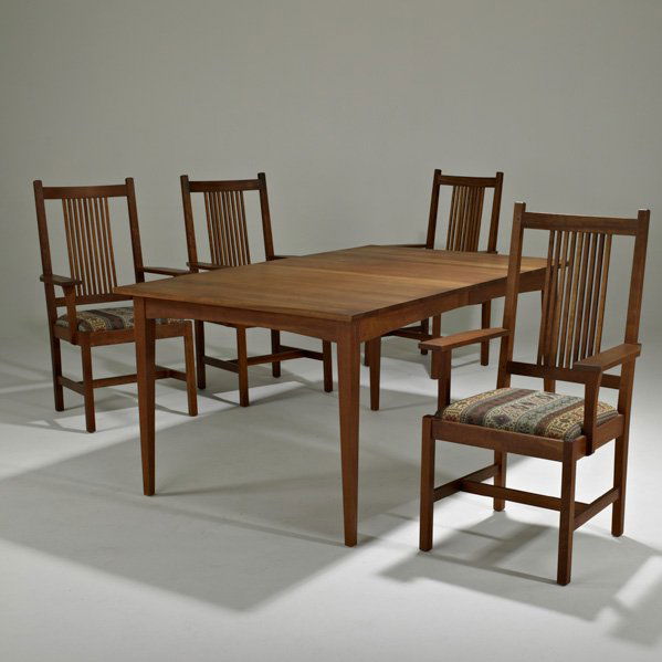 STICKLEY BY E.J AUDI: Contemporary dining table (91-0785-703) and set of four spindle-back dining chairs (91-0330 1/2-703), Manlius, NY, 2000s; Cherry wood and upholstery; Branded; Dining table: 30 1/2" x 61 1/2" x 40", tw