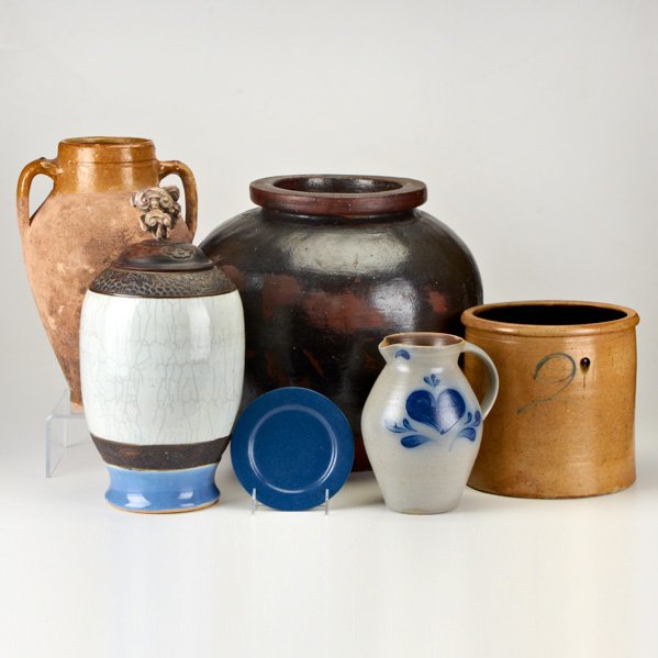 POTTERY GROUP: Six pieces, 19th/20th c.: glazed redware urns, two-gallon crock, Rockdale pitcher, Asian lidded vessels, and SEG plate; Some marked; Tallest: 16 1/2"