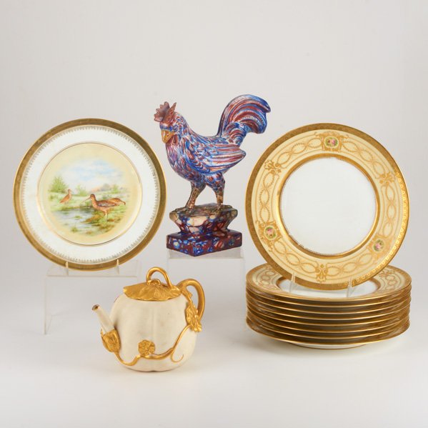 ENGLISH/ EUROPEAN PORCELAIN AND FAIENCE: Twelve pieces, early 19th/20th c.: faience polychrome rooster, nine Bavarian dinner plates with gilt decorated and garland motif, Royal Worcester lobed floriform teapot (restored) and Thomas hand pain