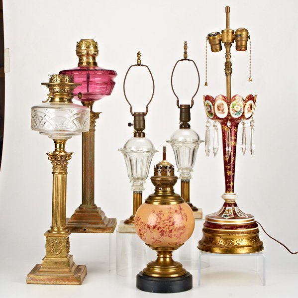 TRADITIONAL LIGHTING: Six pieces including two Victorian brass and glass oil lamps, pair converted whale oil lamps, cranberry luster converted to lamp (as-is), etc.; Tallest: 18"