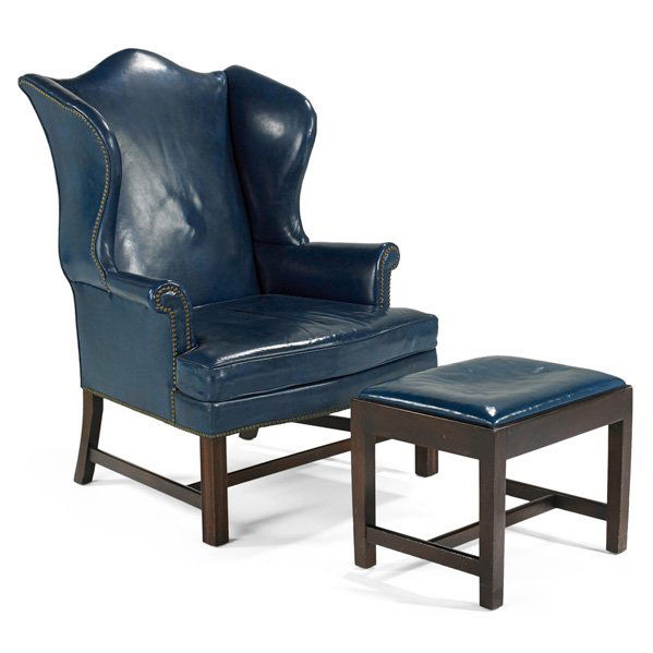 KITTINGER: Wing chair and ottoman, Buffalo, NY, 1960s; Leather, mahogany and brass studs; Branded; Chair: 45 1/2" x 35" x 34"