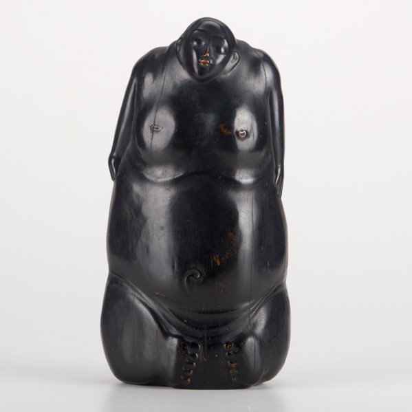 JAPANESE: Carved and ebonized wood figure, 19th/20th c.; Unmarked; 11" x 5 3/4" x 3 3/4"