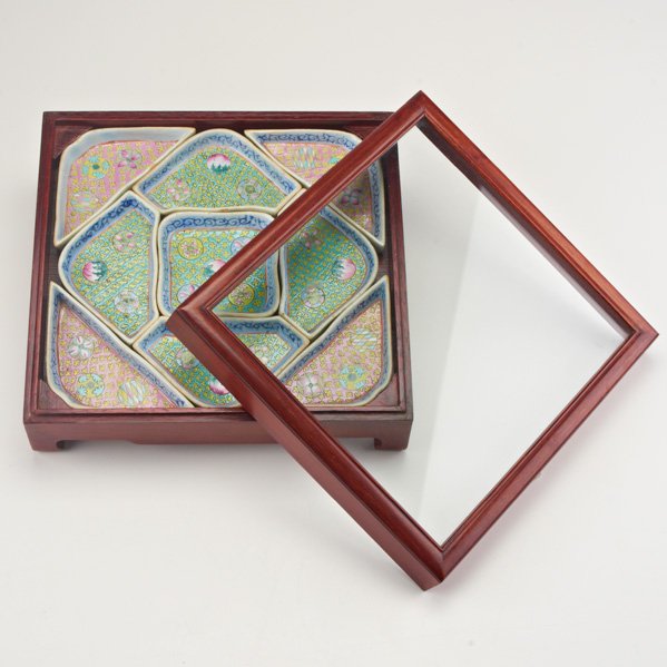 CHINESE PORCELAIN: Nine piece sectional dish in wooden display box, Republic period; Unmarked; Box: 4" x 11" x 11 1/2"