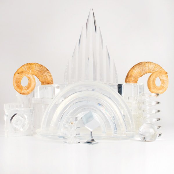 LUCITE: Sixteen pieces: pair of trays, two desk organizers, tabletop sculptures, horn bookends, perfume bottle, and paperweight, USA 1960s/70s; Desk organizers signed Van Teal; Tallest: 18 1/2"