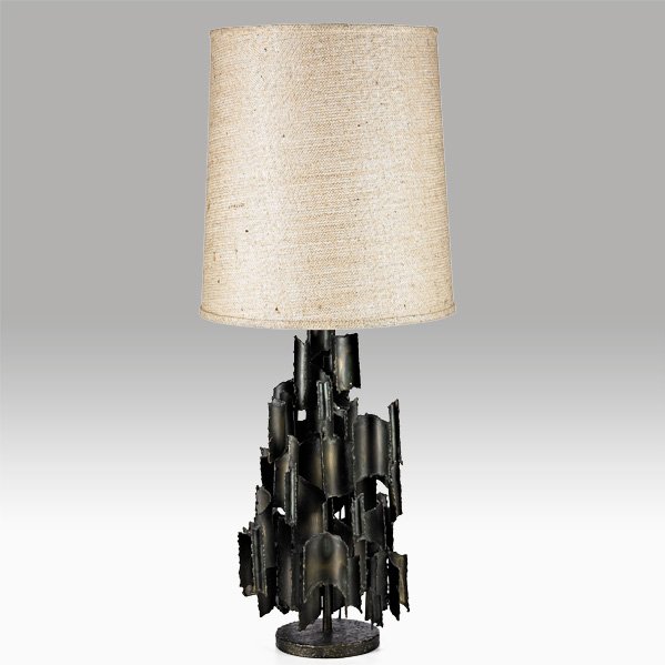 MARCELLO FANTONI: Sculptural table lamp, Italy, 1960s; Torch cut, textured and patinated steel, jute, single socket; Overall: 40" x 15 1/2"