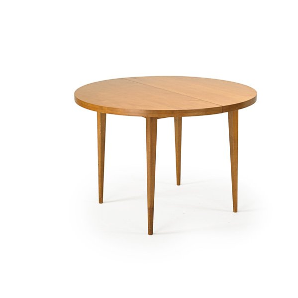 PAUL McCOBB; WINCHENDON: Planner Group extension dining table, USA, 1950s; Maple; Foil label; 29" x 42" dia, two 15" leaves