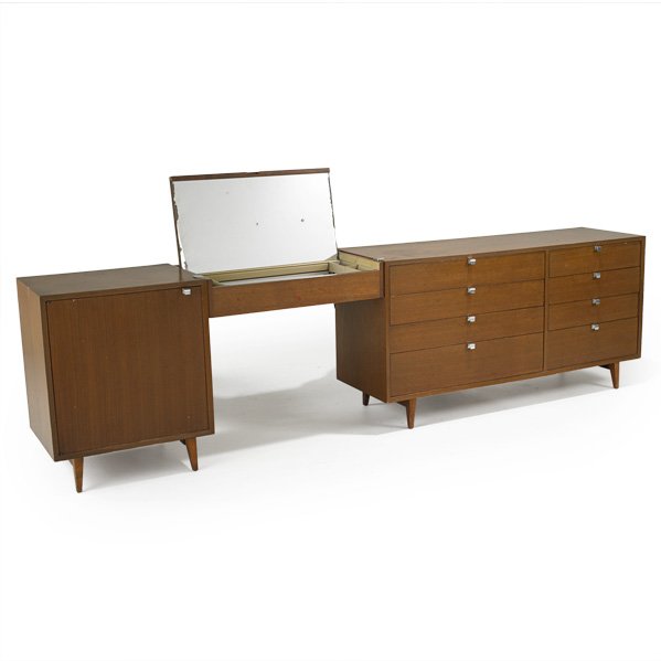 GEORGE NELSON; HERMAN MILLER: Eight-drawer dresser, single door cabinet and flip-top vanity, Zeeland, MI, 1950s; Walnut and aluminum; Total: 29 3/4" x 111 1/2" x 18 1/2"