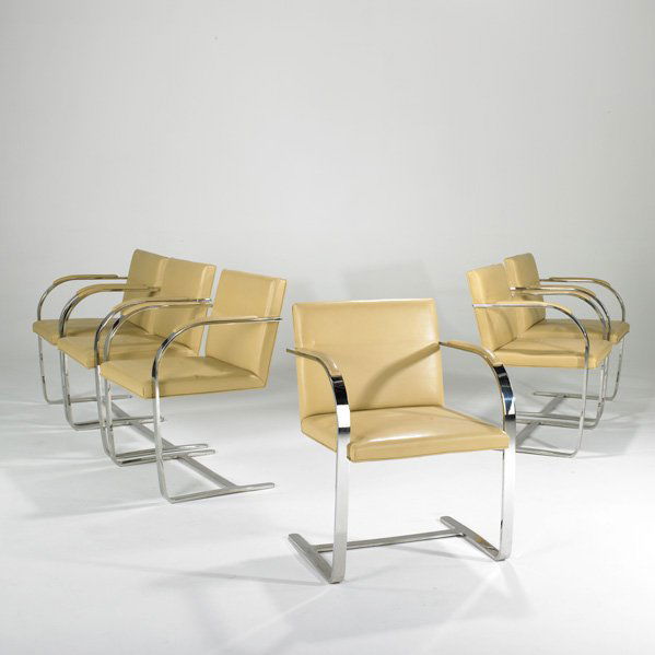BRUETON: Set of six cantilevered dining chairs, New York, 1970s; Leather and chromed steel; Fabric label; 30 1/2" x 22" x 22"