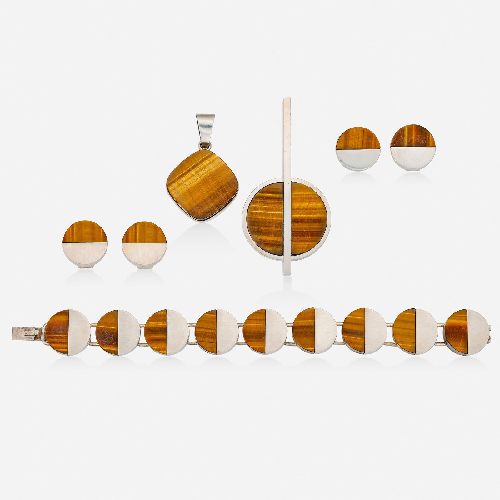 Danish, Group of sterling silver and tiger's eye jewelry: Danish Group of sterling silver and tiger's eye jewelry Comprising two pairs of earrings, a pendant, and a bracelet by Arne Johansen; and a pendant by Bent Knudsen; each set with polished plaques of t