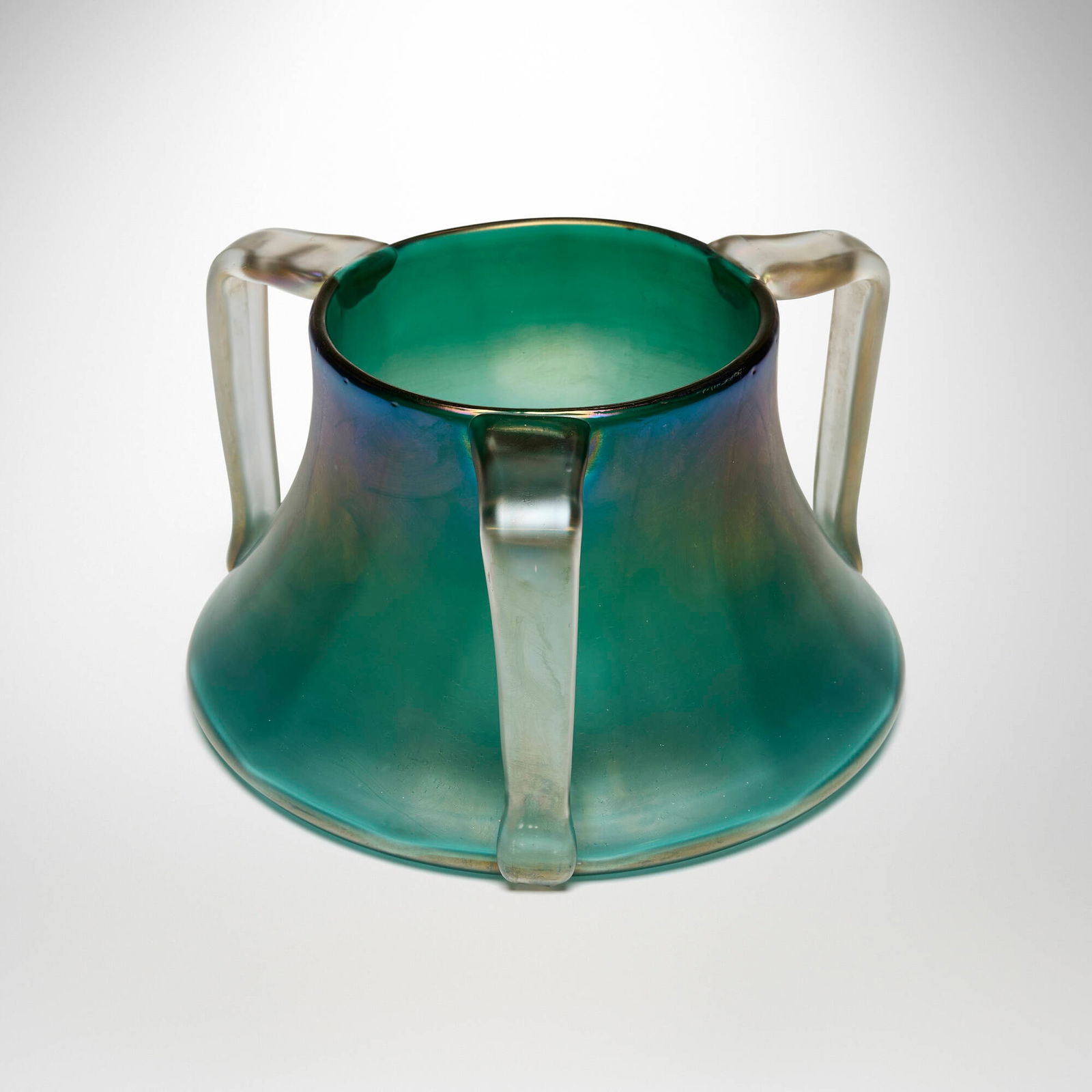 Marie Kirschner for Loetz, Large vase: Marie Kirschner for Loetz Large vase Austria, c. 1902iridized glass 7.5 h x 13.75 dia in (19 x 35 cm) Vase features three handles. Incised signature to underside 'MK'. Provenanc