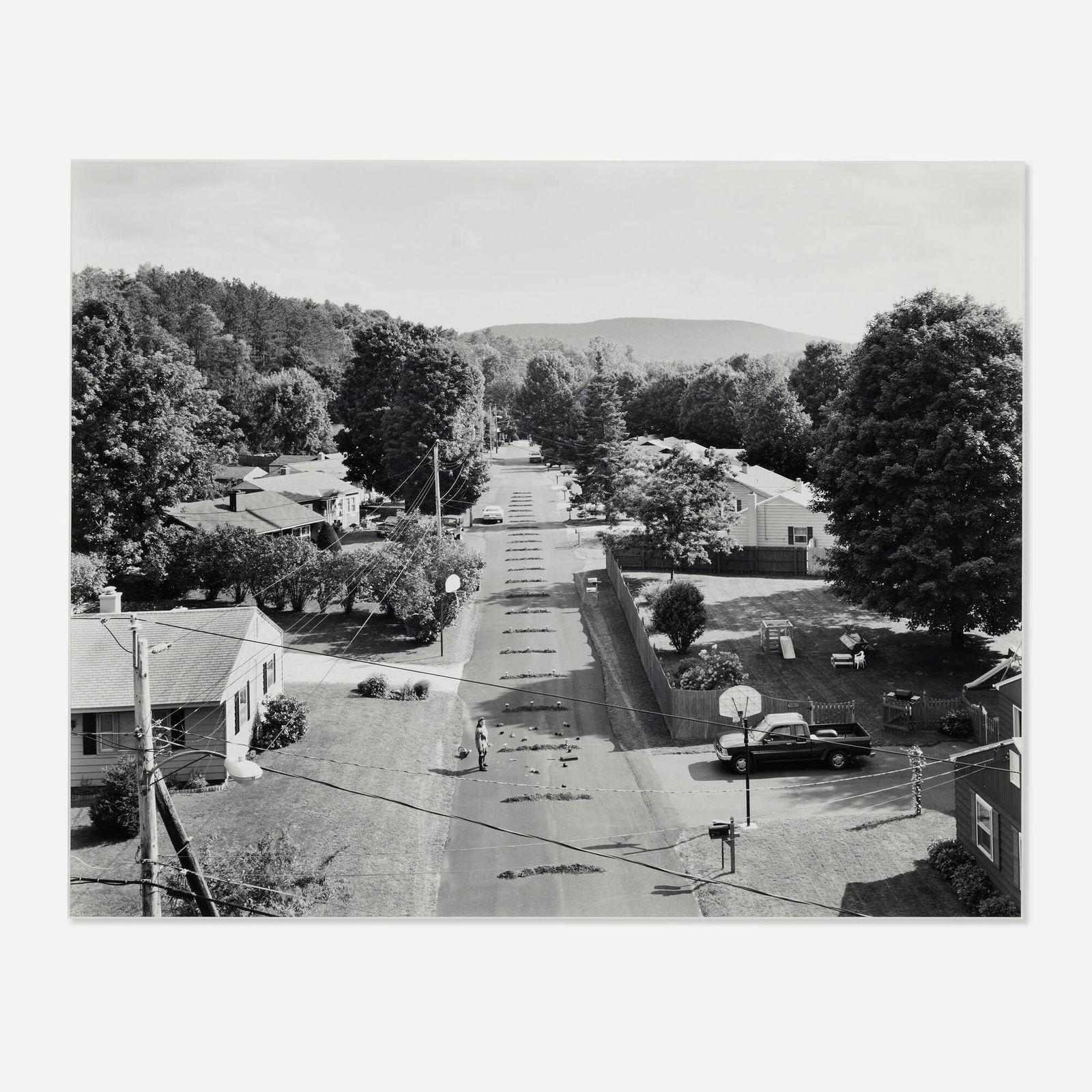 Gregory Crewdson, Untitled (Woman Planting in Road): Gregory Crewdson Untitled (Woman Planting in Road) 1996gelatin silver print mounted to mat board image: 18 h x 22.75 w in (46 x 58 cm) sheet: 20 h x 24 w in (51 x 61 cm) mount: 25.5 h x 29.5 w
