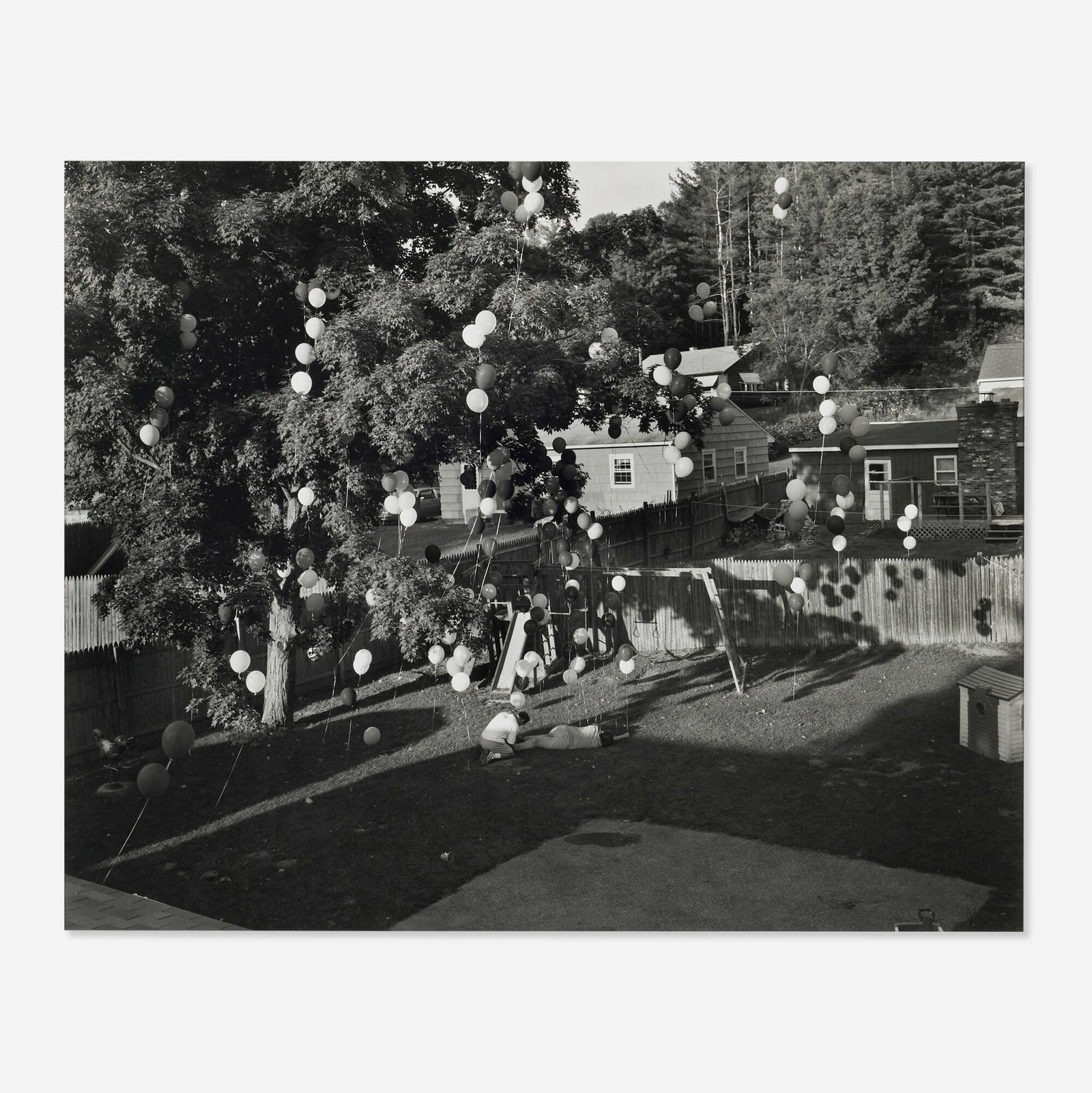 Gregory Crewdson, Untitled (Balloons in Backyard): Gregory Crewdson Untitled (Balloons in Backyard) 1997gelatin silver print image: 18 h x 22.25 w in (46 x 57 cm) sheet: 20 h x 23.75 w in (51 x 60 cm) Signed, dated and numbered to lower rig