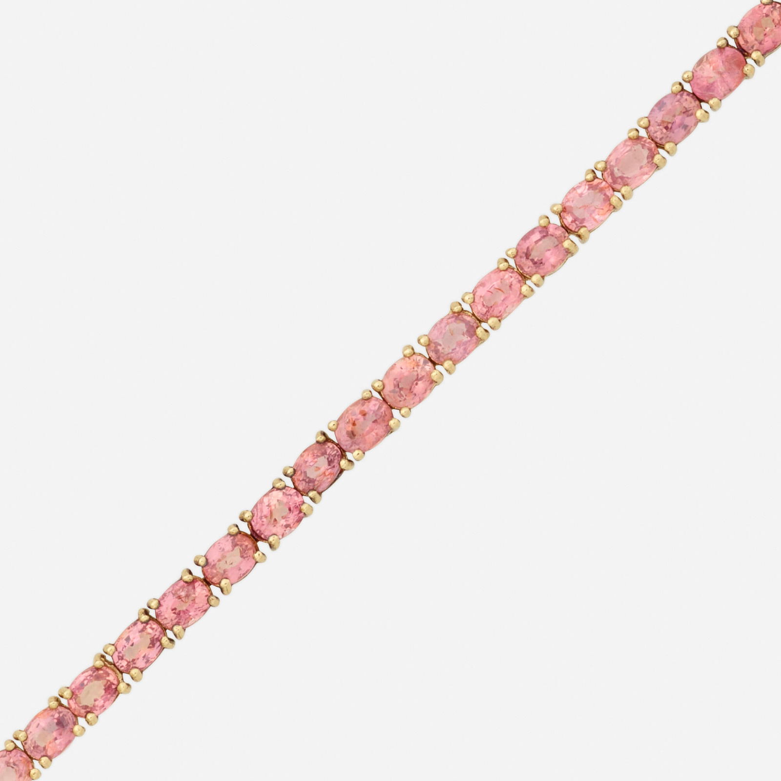 Pink sapphire and gold bracelet (1 of 3)