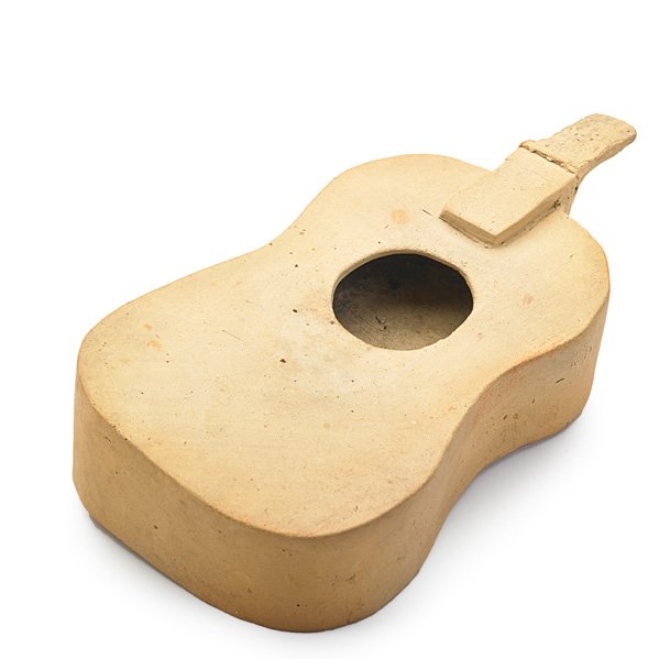 GEORGE OHR Bisque guitar novelty: GEORGE OHR Bisque partial guitar novelty, Biloxi, MS, 1888-92; Script signature, BILOXI Pottery G.E. Ohr; 1 1/4" x 6" Published: Ellison, George Ohr, Art Potter, pl. 42