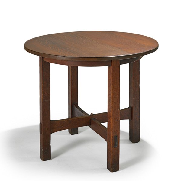 GUSTAV STICKLEY Early lamp table: GUSTAV STICKLEY Lamp table with stacked trumpet stretchers, Eastwood, NY, ca 1902; Early red decal in box; 29 1/2" x 36"