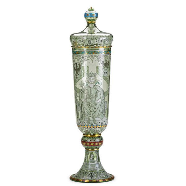 J & L LOBMEYR Large enameled jar: J & L LOBMEYR Exceptional tall coupe with crown-shaped cover, enamel-decorated in the medieval style, Vienna, 1880s; Lobmeyr mark; Total: 24" x 6 1/2"