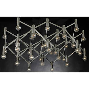 OTT INTERNATIONAL Massive chandelier: OTT INTERNATIONAL Massive chandelier, Germany, 1970s; Chromed steel, wiring, thirty-five sockets; Unmarked; Fixture only: 26" x 64" dia.