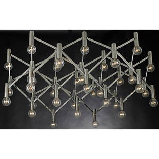 OTT INTERNATIONAL Massive chandelier: OTT INTERNATIONAL Massive chandelier, Germany, 1970s; Chromed steel, wiring, thirty-five sockets; Unmarked; Fixture only: 26" x 64" dia.