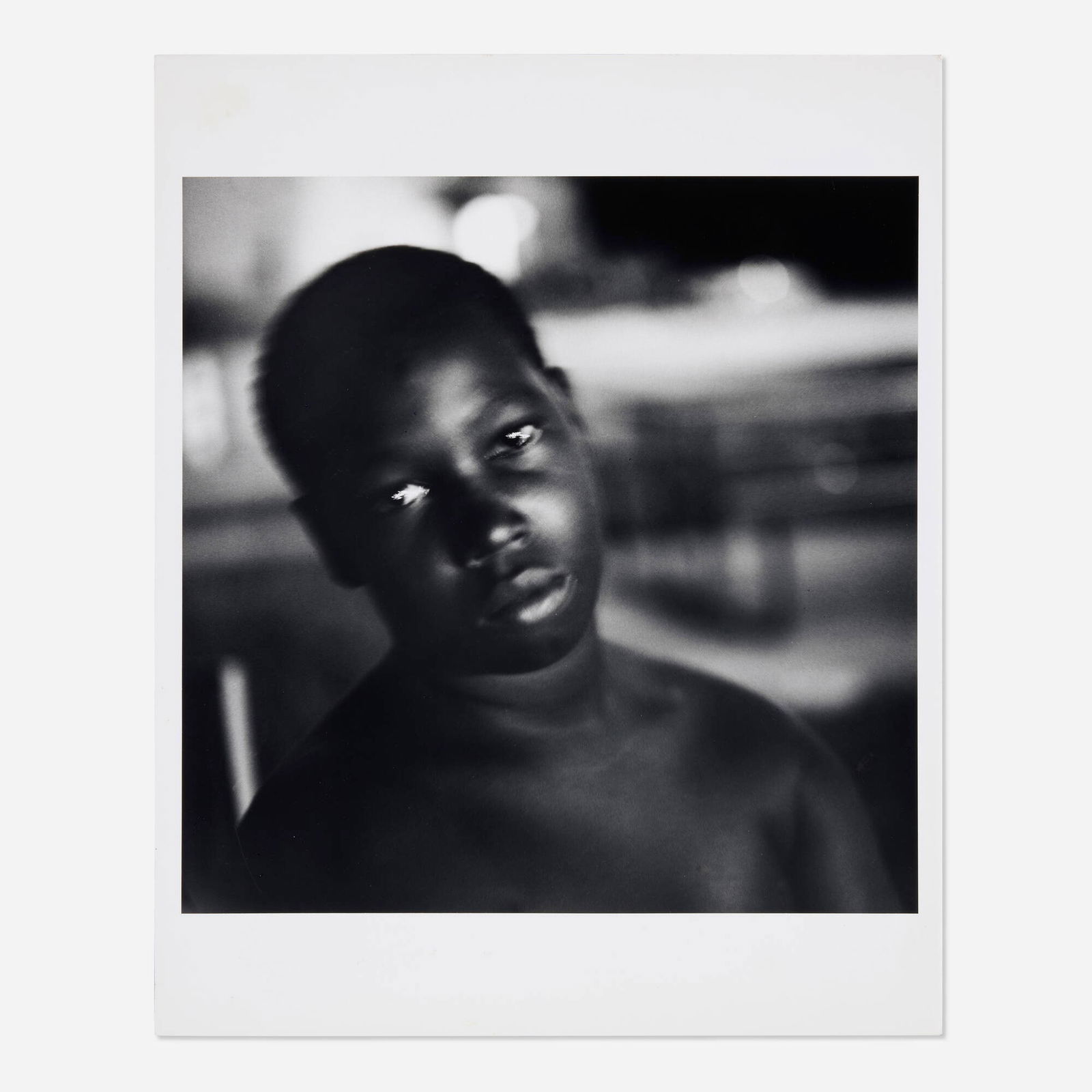 Earlie Hudnall, Jr., Boy at Sundown: Earlie Hudnall, Jr. Boy at Sundown 1993gelatin silver print from Polaroid Type 665 Positive/Negative film image: 15 h x 15 w in (38 x 38 cm) sheet: 20 h x 16 w in (51 x 41 cm) Signed, title