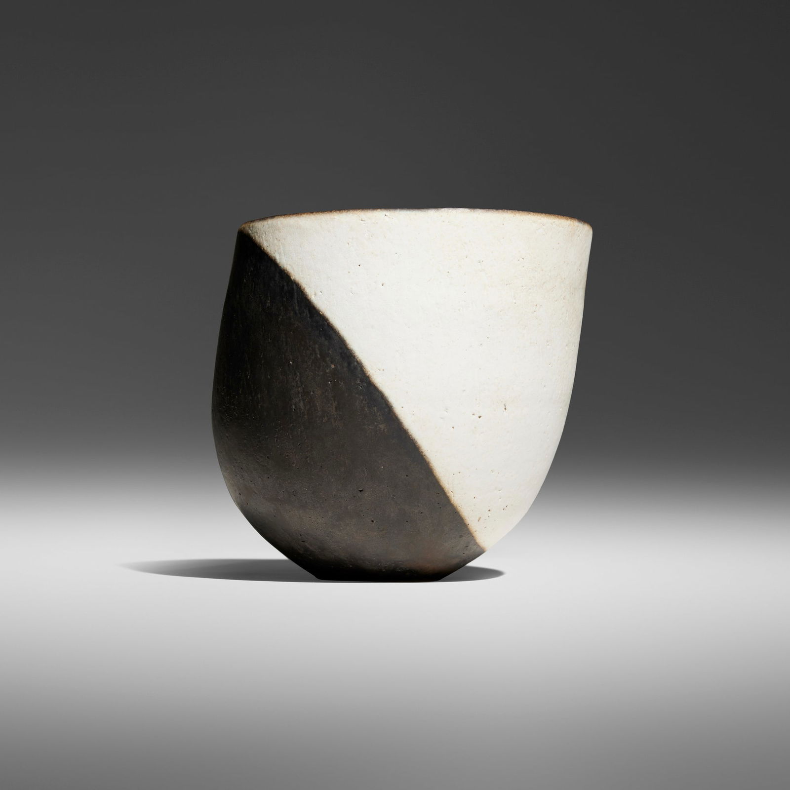 John Ward, Black and White Vessel: John Ward Black and White Vessel c. 1990glazed stoneware 5.75 h x 6 dia in (15 x 15 cm) Impressed signature to underside 'JW'. Provenance: Private Collection, Virginia