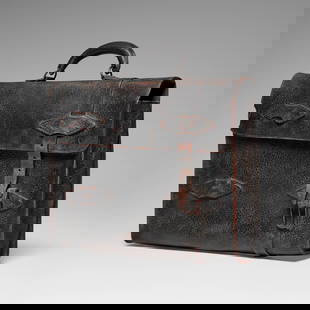 Marilyn Levine, Hanging Black Briefcase with Missing Strap: Marilyn Levine Hanging Black Briefcase with Missing Strap 1983 hand-built and glazed stoneware, metal 15 h x 16 w x 2.5 d in (38 x 41 x 6 cm) Incised signature, date, and number to reverse 'Levine