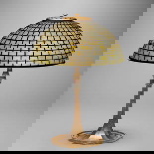Tiffany Studios, Geometric table lamp: Tiffany Studios Geometric table lamp USA, c. 1910acid-etched and gilt bronze, leaded glass 16.5 h x 11.875 dia in (42 x 30 cm) Lamp features a 12-Sided base. Impressed to shade 'TIFF