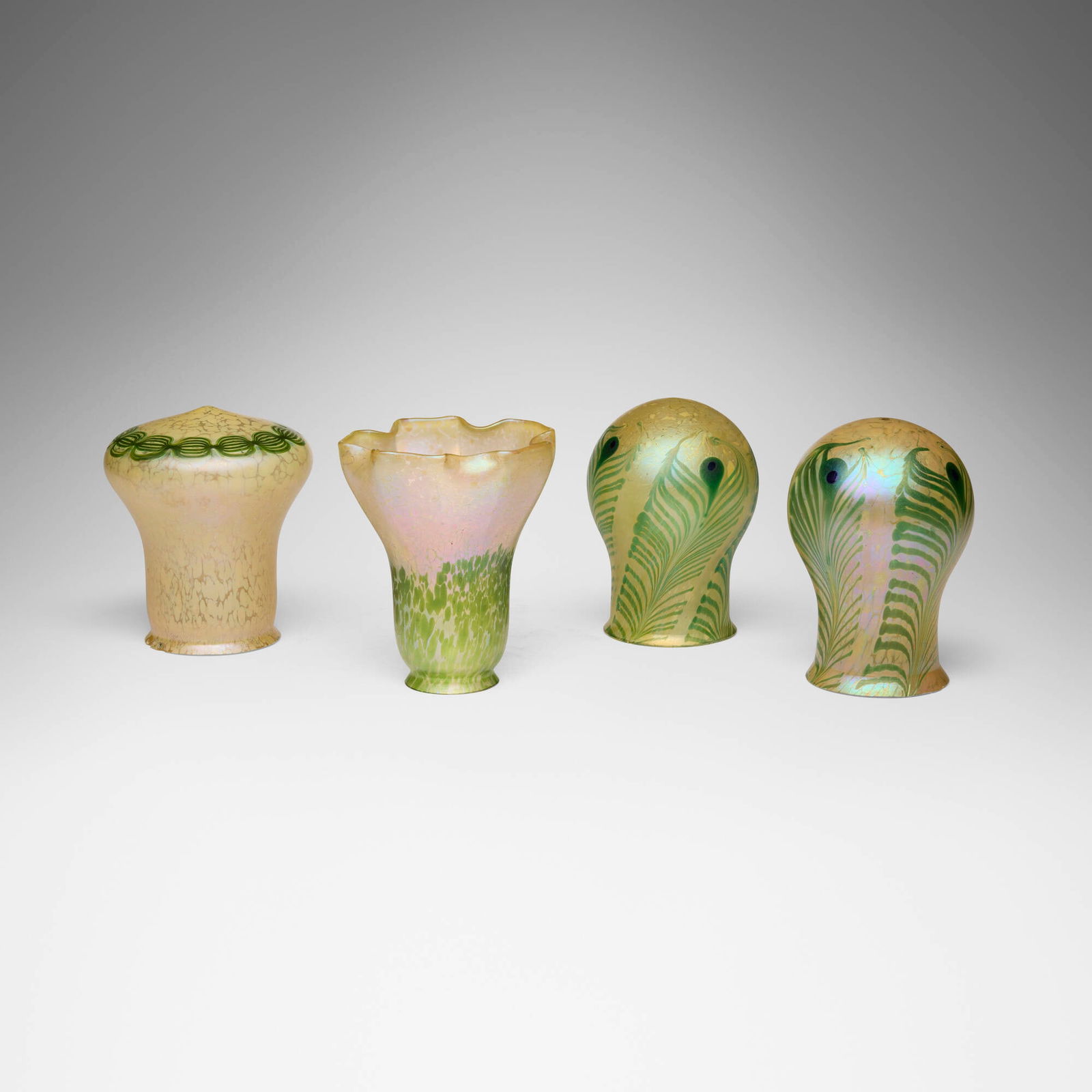 Bohemian, Collection of four shades: Bohemian Collection of four shades c. 1910hand-blown glass tallest: 6 h x 4 dia in (15 x 10 cm) shortest: 5.75 h x 4 dia in (15 x 10 cm) Collection includes one example by Loetz (PG 7211).