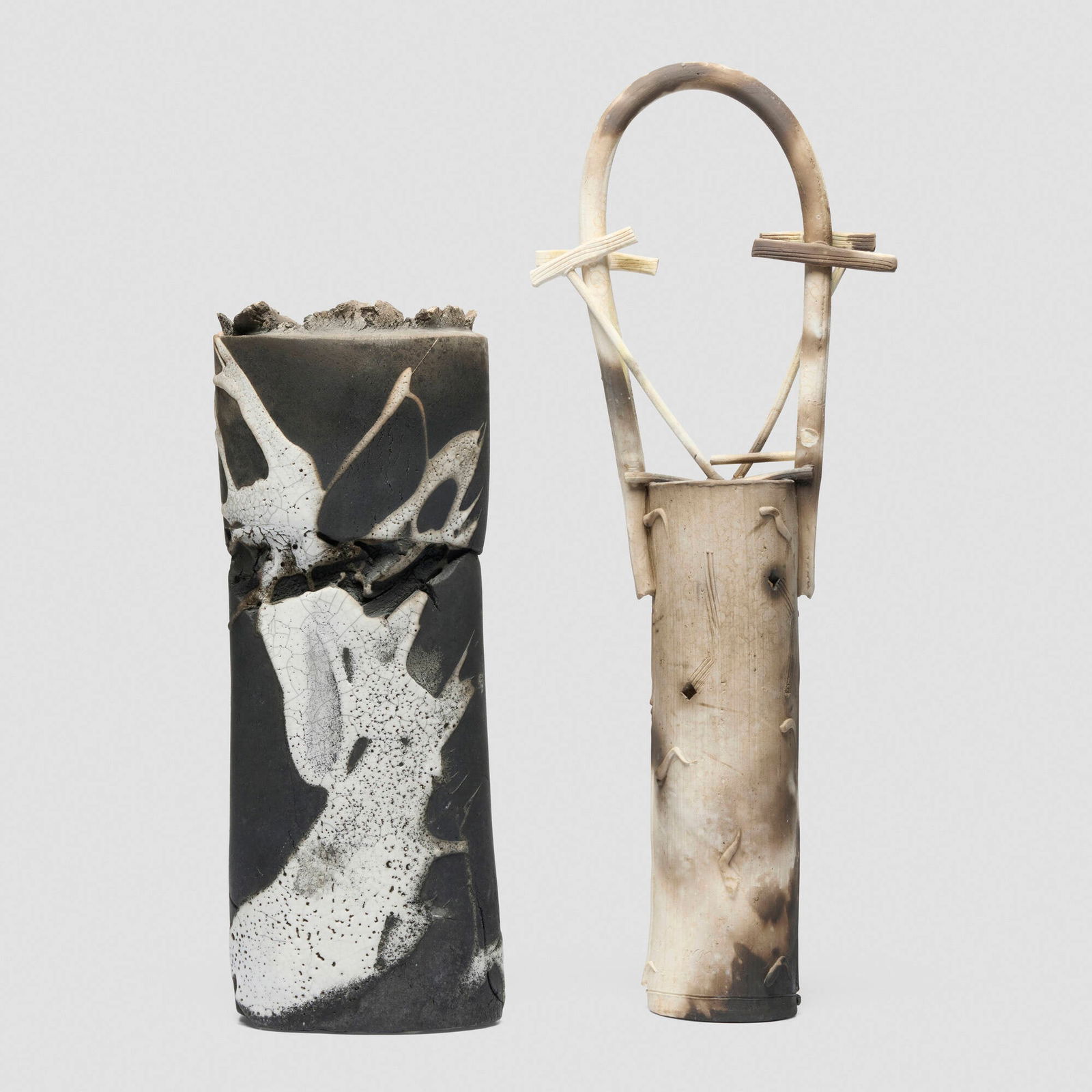 Nina Gelardi, Vases, set of two: Nina Gelardi Vases, set of two c. 1985glazed and raku-fired earthenware, wood-fired earthenware 19.25 h x 7.5 w x 3 d in (49 x 19 x 8 cm) 14 h x 5.75 w x 4 d in (36 x 15 x 10 cm) Incised si