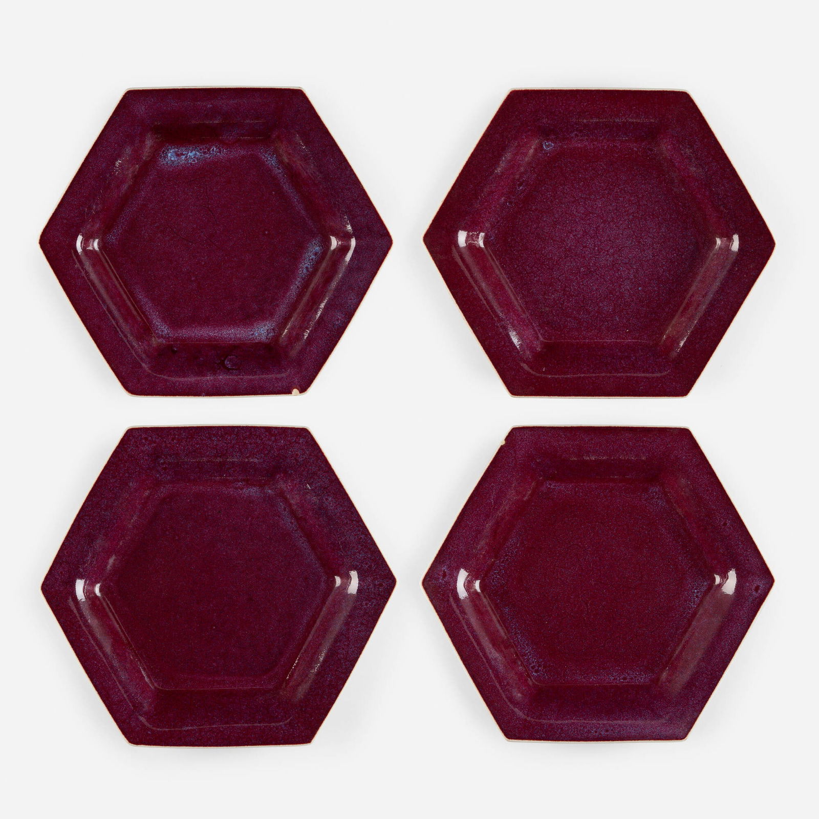 Brother Thomas Bezanson, Hexagonal plate, set of four: Brother Thomas Bezanson Hexagonal plate, set of four c. 1980purple-glazed porcelain 1.25 h x 10.625 w x 9.625 d in (3 x 27 x 24 cm) Incised signature to underside of each example 'Benedictine
