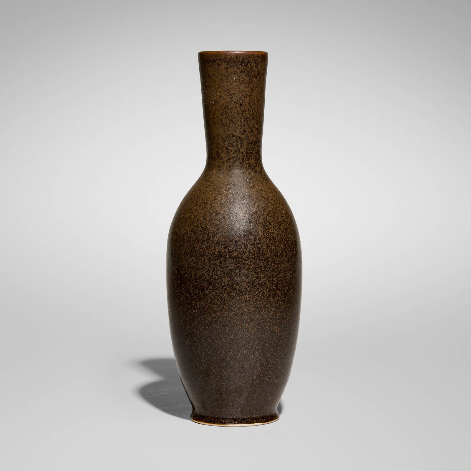 Brother Thomas Bezanson, Vase: Brother Thomas Bezanson Vase c. 1980textured iron-glazed porcelain 8.75 h x 2.75 dia in (22 x 7 cm) Incised signature to underside 'Benedictine Monks Weston Vermont' and numbered '500/55'.