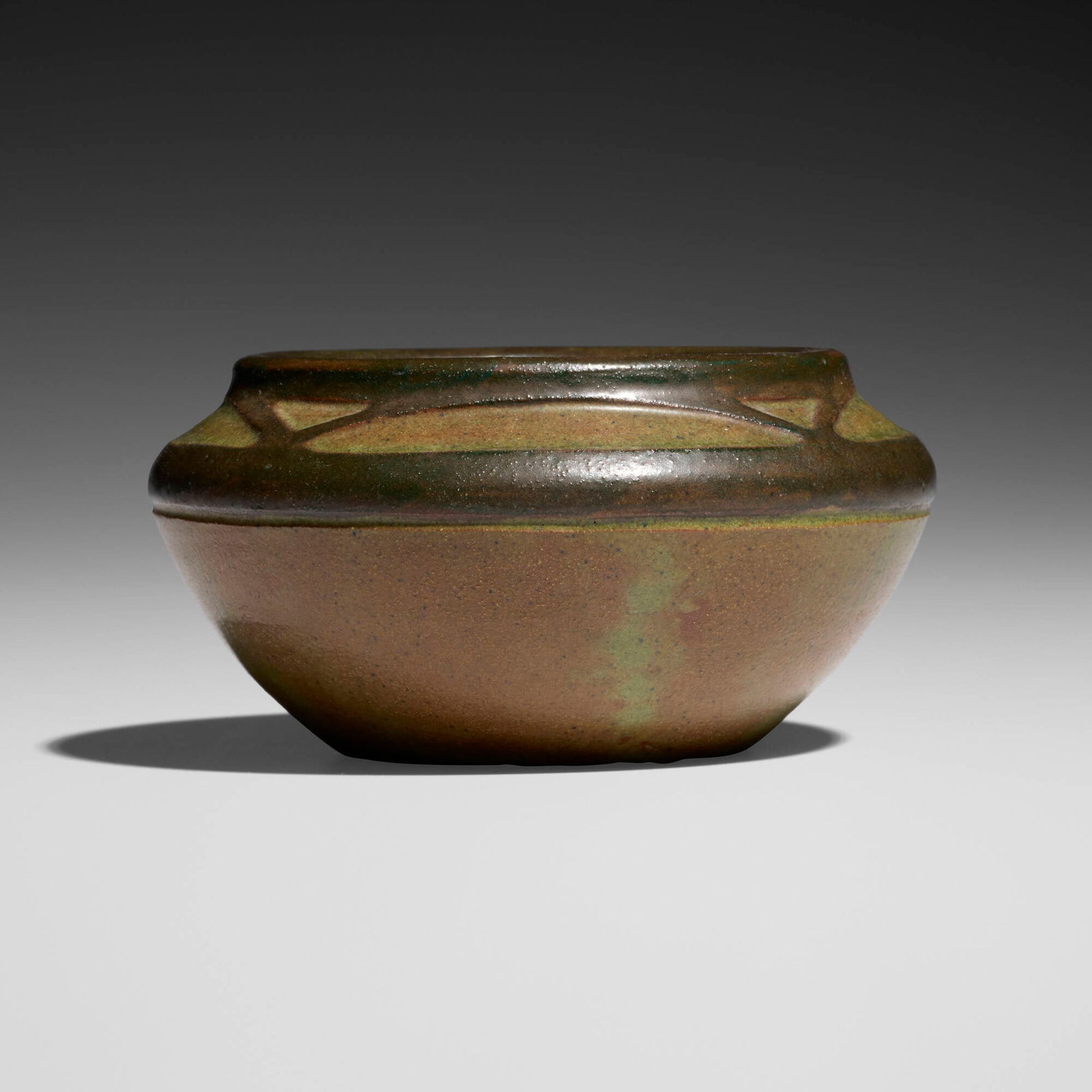 Arthur Hennessey and Sarah Tutt for Marblehead Pottery, Bowl with Native American design: Arthur Hennessey and Sarah Tutt for Marblehead Pottery Bowl with Native American design USA, 1908-16glazed earthenware 2.5 h x 5 dia in (6 x 13 cm) Impressed manufacturer's mark to underside '