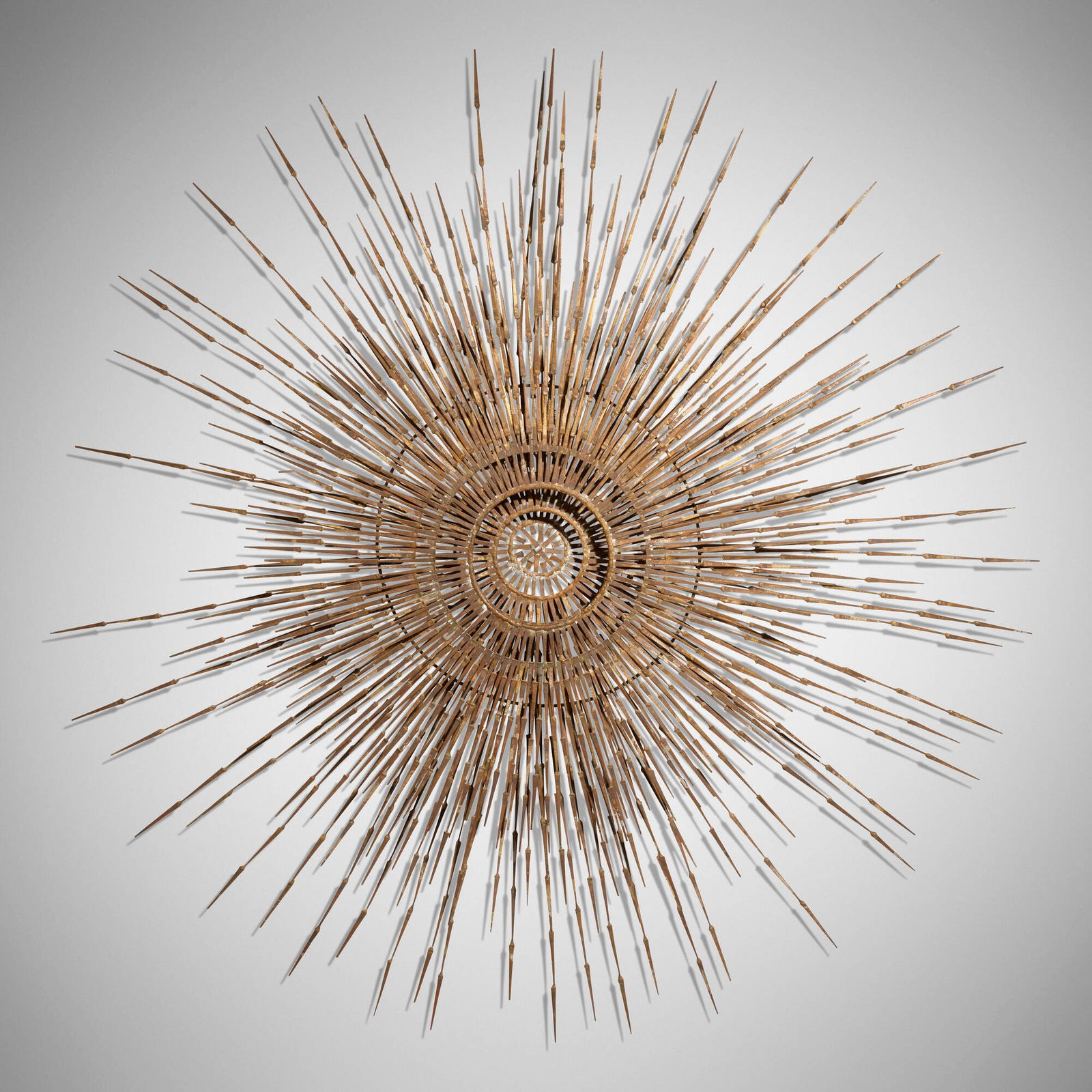 William Bowie, attribution, Sunburst: William Bowie, attribution Sunburst c. 1965gilt steel 7 d x 70 dia in (18 x 178 cm) This work will ship from Lambertville, New Jersey.