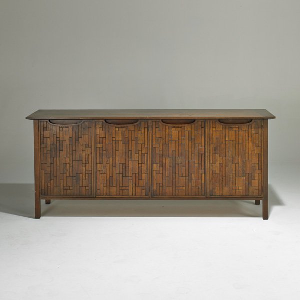 BERT ENGLAND (Attr.); JOHN STUART: Four door cabinet, USA, 1960s; Walnut and mahogany; Metal label; 32" x 76" x 19 1/2"