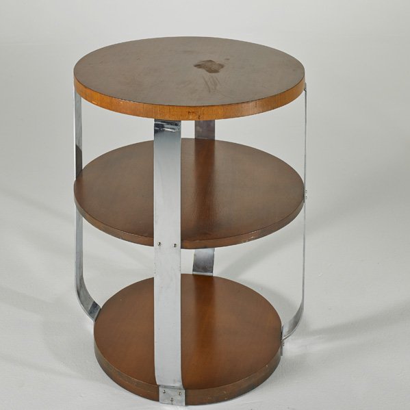 MODERNAGE: Tiered occasional table, USA, 1930s; Chromed steel and walnut; Unmarked; 29 1/2" x 24 1/2" dia.