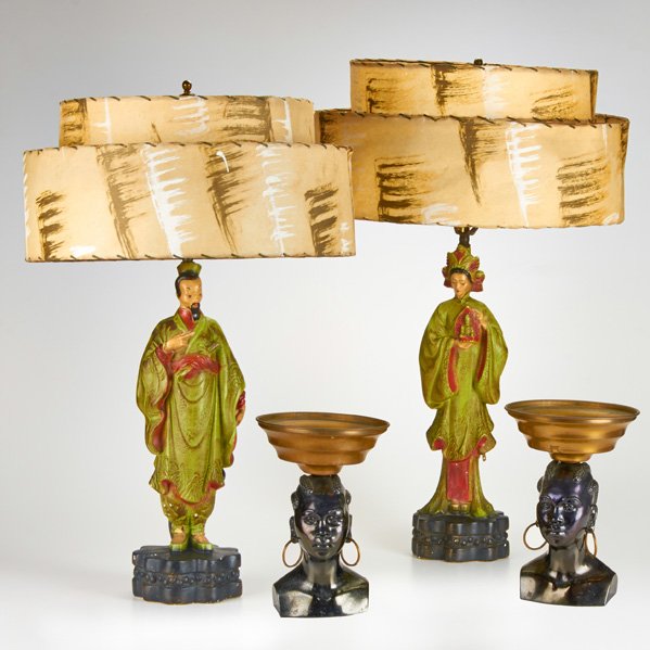 RETRO: Pair of Asian figural polychrome plaster lamps, mid 20th c. together with pair of African figural patinated metal compotes; Compotes marked; Lamps: 30" x 18" with shades