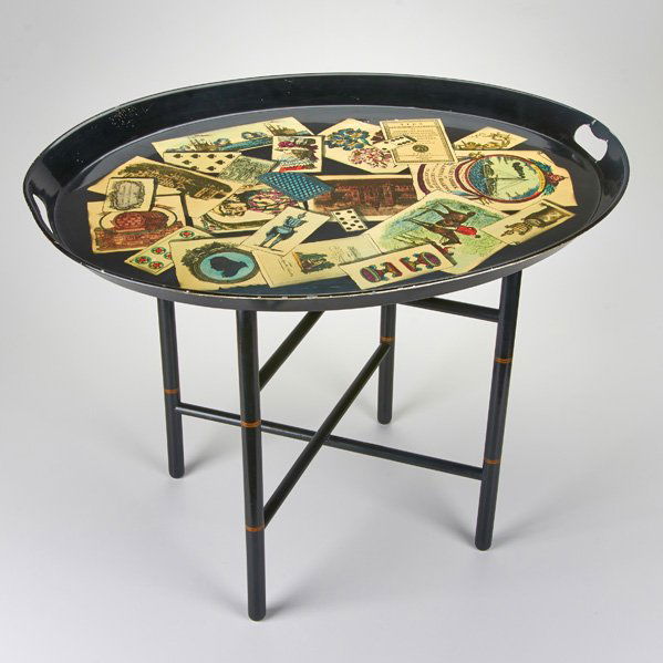 PIERRO FORNASETTI: Two handled tray table; Paint decorated aluminum; Marked; Tray: 27 1/4" x 22"
