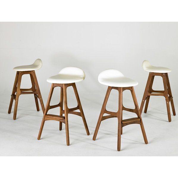 ERIC BUCK: Four barstools, 2000s; Leather and walnut; Unmarked; Each: 30" x 15" x 16"