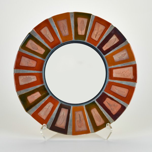 ROGER CAPRON; VALLAURUS: Wall-hanging mirror , France 1960s; Glazed terra-cotta and mirrored glass, 20th c. ; Marked; 15 1/2" dia.