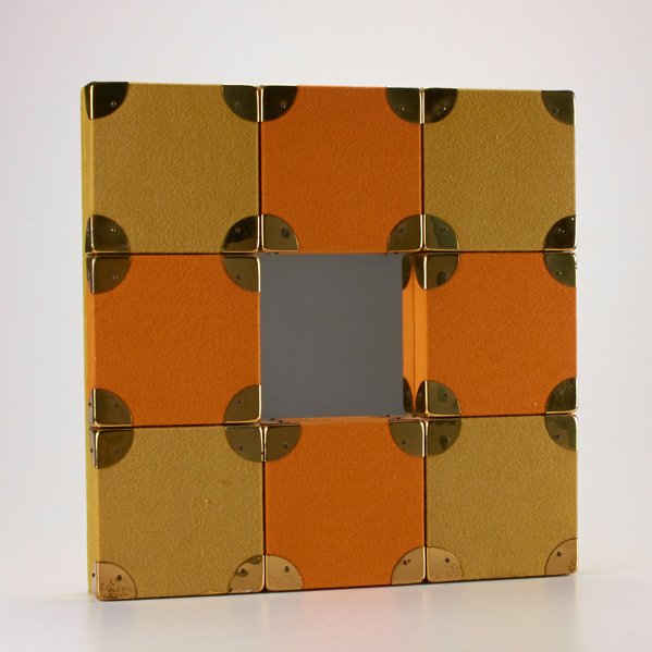 ALEXANDER GIRARD; HERMAN MILLER: Mirror, 20th c. : orange and green fabric and brass surround; 18 1/2" x 18 1/2"