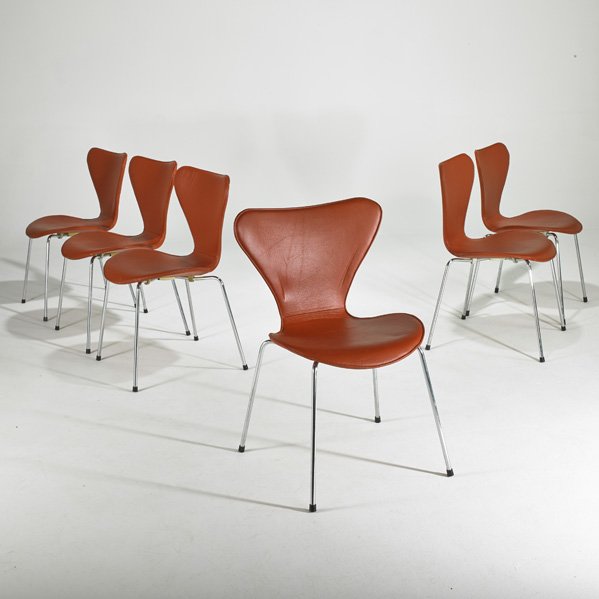 ARNE JACOBSEN; FRITZ HANSEN: Set of six "3107" chairs, Denmark, 1980s; Chromed steel legs, beech plywood seats and removable leather covers; Raised signatures; Each: 31" x 20" x 19"