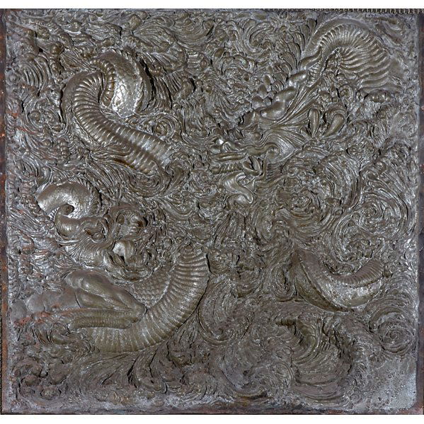 CAST IRON FIREBACK: Relief molded mythical dragon design, 19th c.; Stamped James S. Conover; 35 1/4" x 35 1/2"