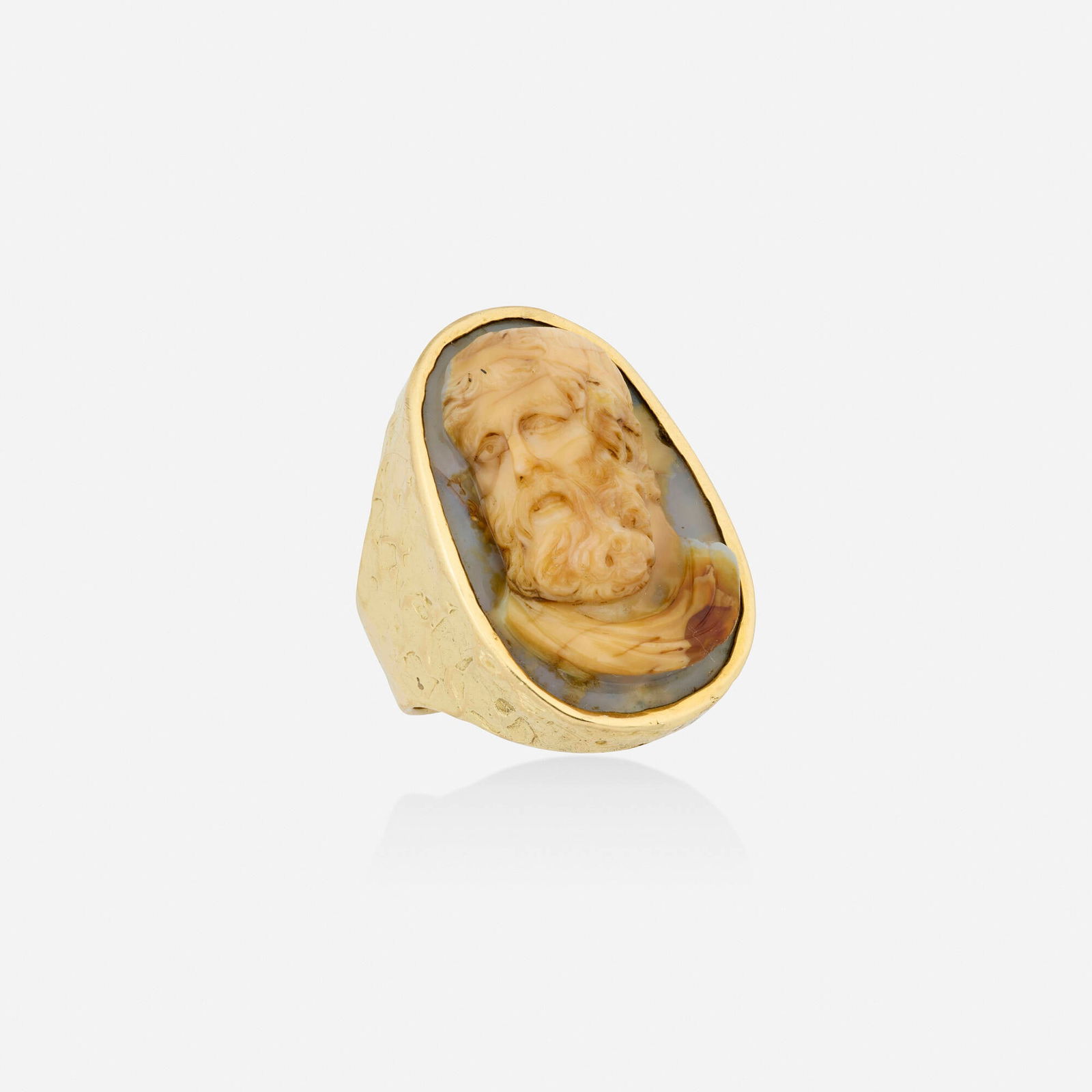 Ed Wiener, Gold and agate ring: Ed Wiener Gold and agate ring Set with a carved agate cameo of a man's profile 18k yellow gold Signed EW Ring size 9.75; Gross weight 18.6 dwts This work will ship from Lambe
