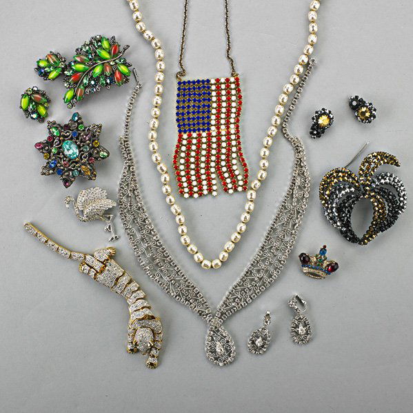 COSTUME JEWELRY, 1930-1990: Fifteen pieces: Miriam Haskell glass pearl necklace, 22"; Trifari jeweled crown brooch #137542; Silvered metal jeweled star brooch; Austrian patinated metal "fireworks" brooch and matching clip earrin