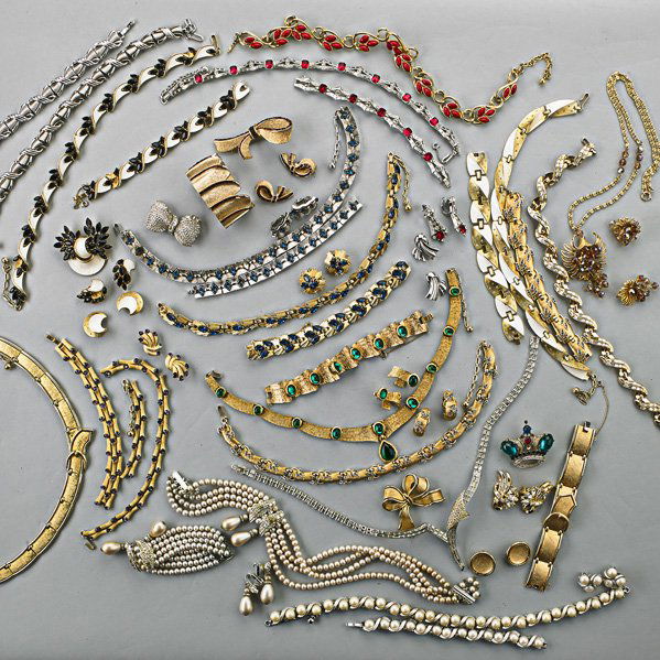 COLLECTION OF COSTUME JEWELRY, 1950-1970: Sixty-eight pieces includes: Twelve suites by Trifari; Vendome "pearl and diamond" suite; Bergere "ruby" and gold partial suite; Bergere asymmetric rhinestone necklace; Trifari crown brooch; Weiss rib