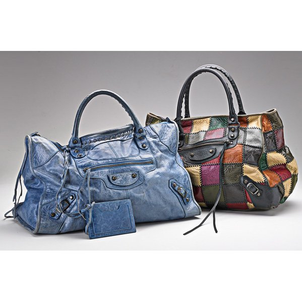 TWO FASHION LEATHER HANDBAGS: Style of Balenciaga: "Work bag" in denim blue leather, #132110, with extra fringe and dust bag, 11" x 8" x 7"; Multicolored patchwork handbag with antique brass hardware, #228755-002123, 14" x 11" x 1