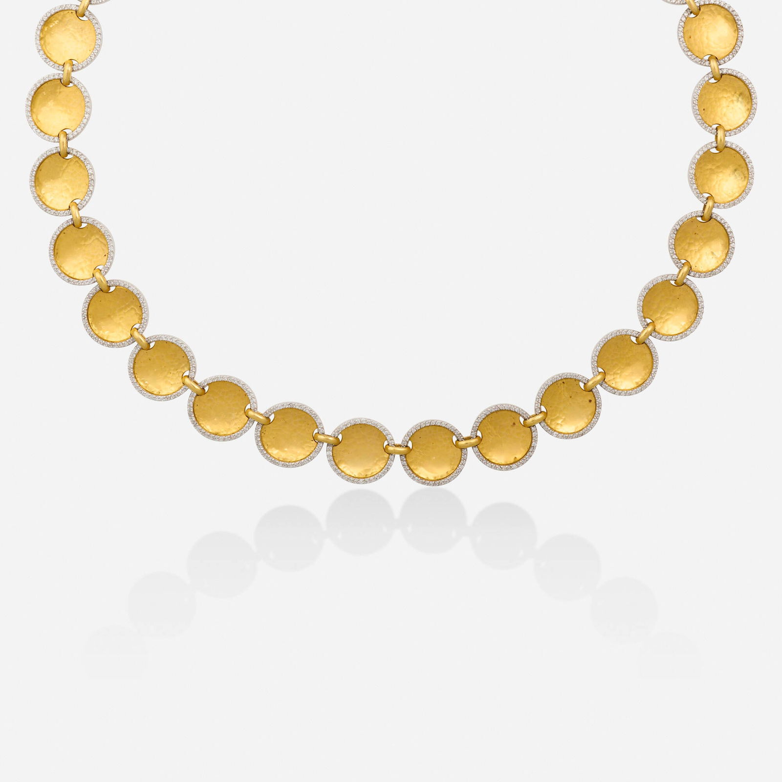 Gurhan, Diamond, gold, and platinum necklace: Gurhan Diamond, gold, and platinum necklace Designed with hammered gold disks framed with round brilliant-cut diamonds Platinum, 22k and 18k yellow gold Signed Gurhan, numbered 18 in; Gross weight 3