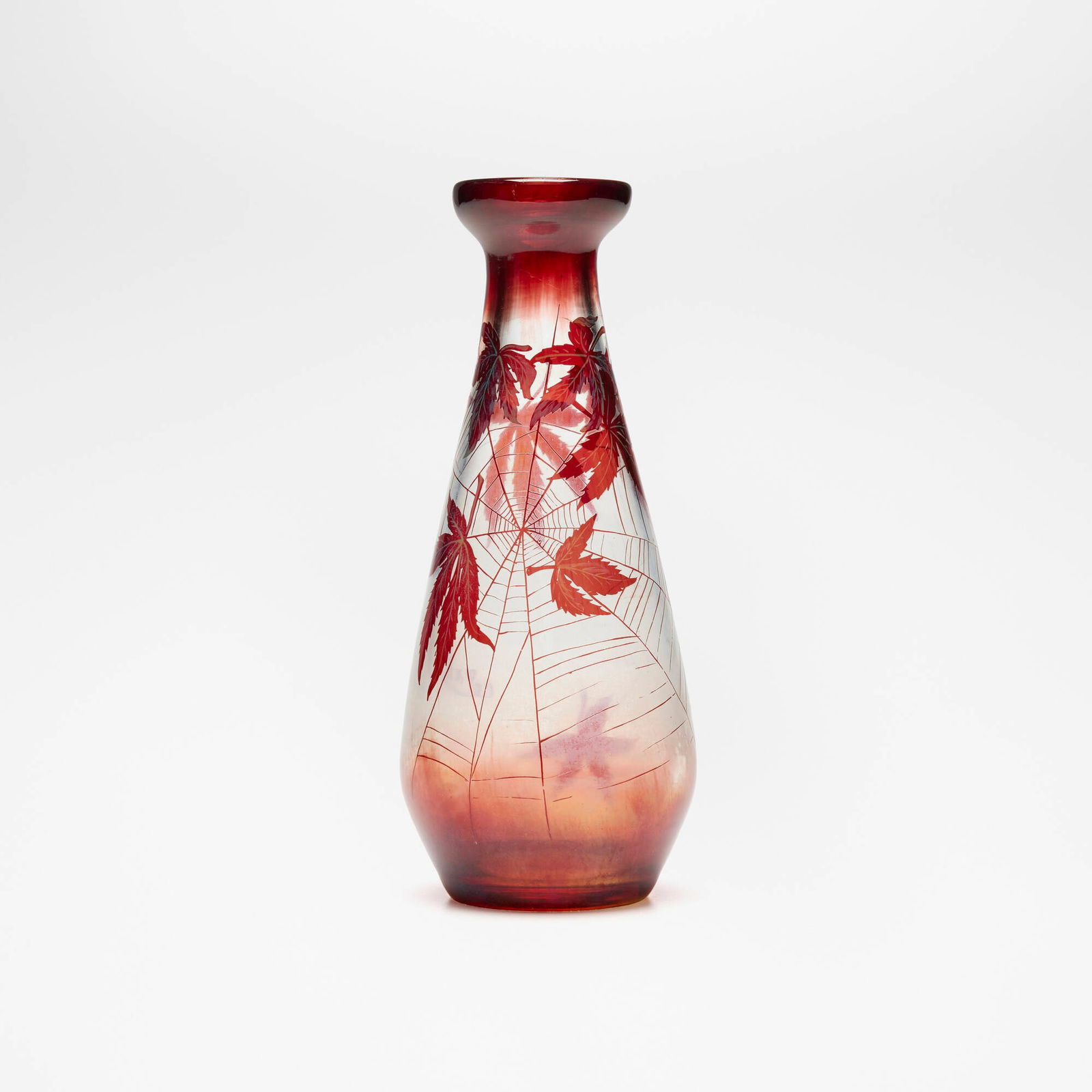 Galle, Vase with spiderweb and Japanese maple leaves: Galle Vase with spiderweb and Japanese maple leaves France, c. 1900acid-etched opalescent cameo glass 8.875 h x 3.125 dia in (23 x 8 cm) Signed in cameo to glass 'Galle'. Proven