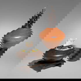 William and Marianne Hunter, Spring Mesa; Tales of the Red Planet (two works): William and Marianne Hunter Spring Mesa; Tales of the Red Planet (two works) 1985pink ivory wood, cocobolo, enameled metal, agate 9.125 h x 4.25 dia in (23 x 11 cm) 4.625 h x 4.375 dia in (12 x 11